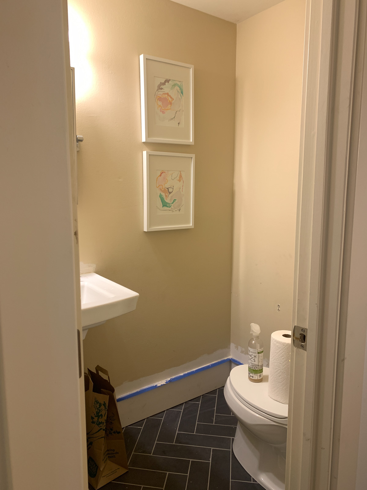 poweder bath before with tan walls